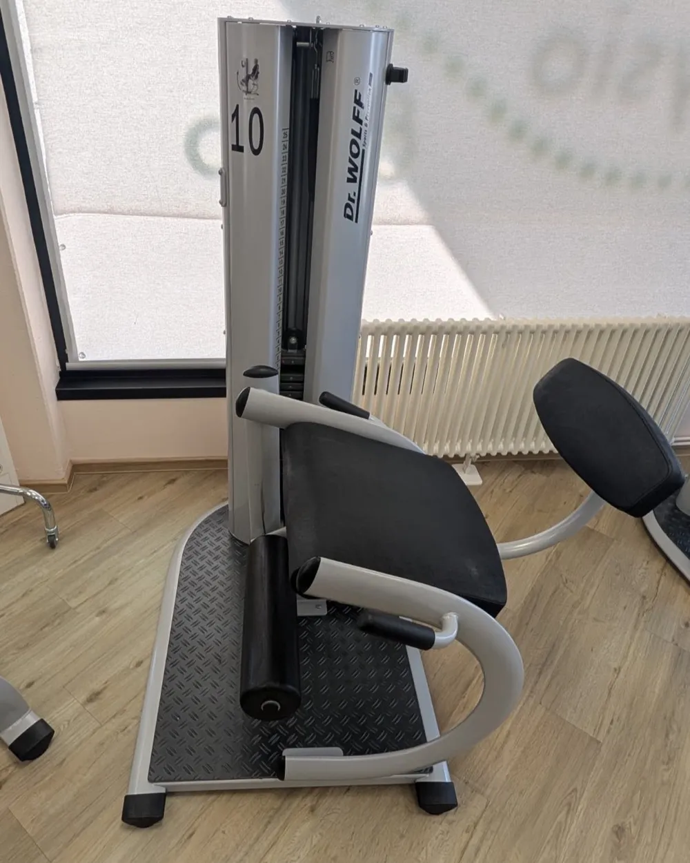 Beinstrecker auf der Trainingsfläche